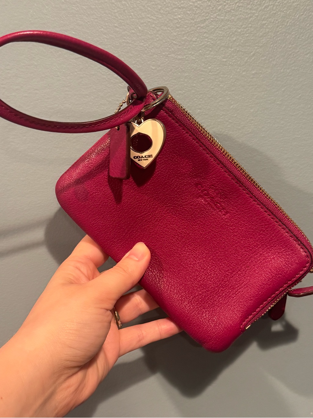 Coach Magenta Leather Wristlet With Gold Heart Charm
